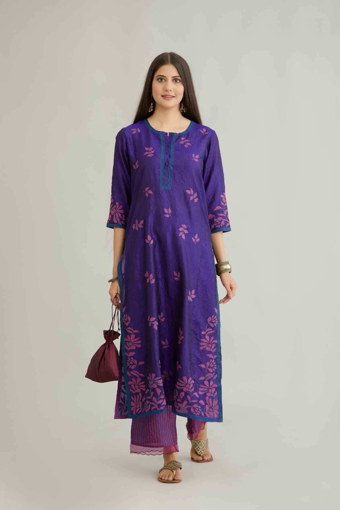 Blue hand crushed silk kurta set with all-over contrast silk fabric applique work and embroidered button placket neckline.