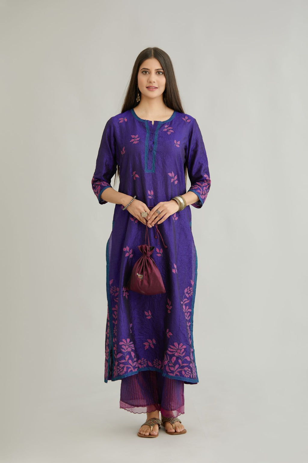 Blue hand crushed silk kurta set with all-over contrast silk fabric applique work and embroidered button placket neckline.
