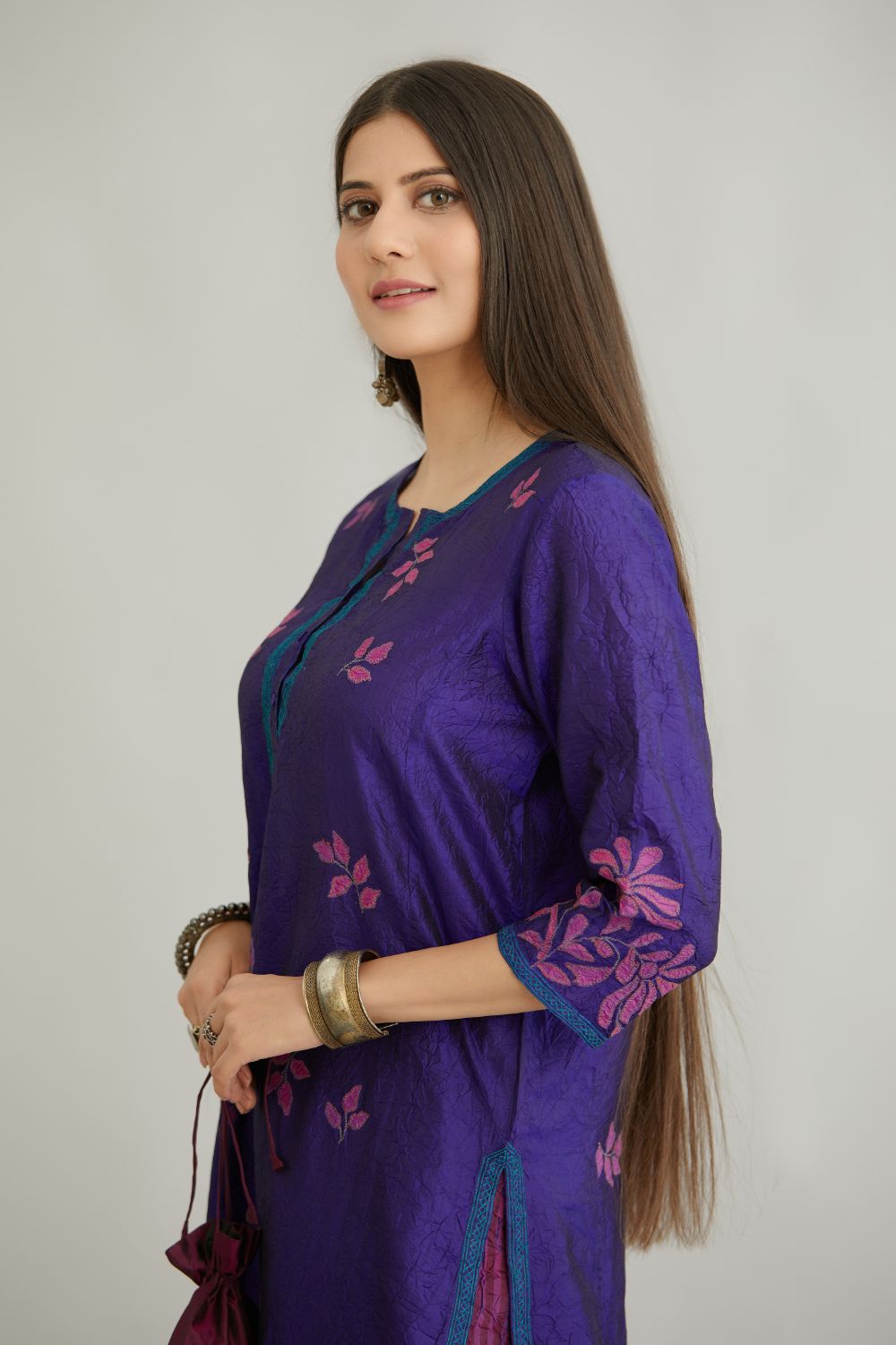 Blue hand crushed silk kurta set with all-over contrast silk fabric applique work and embroidered button placket neckline.