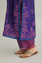 Blue hand crushed silk kurta set with all-over contrast silk fabric applique work and embroidered button placket neckline.