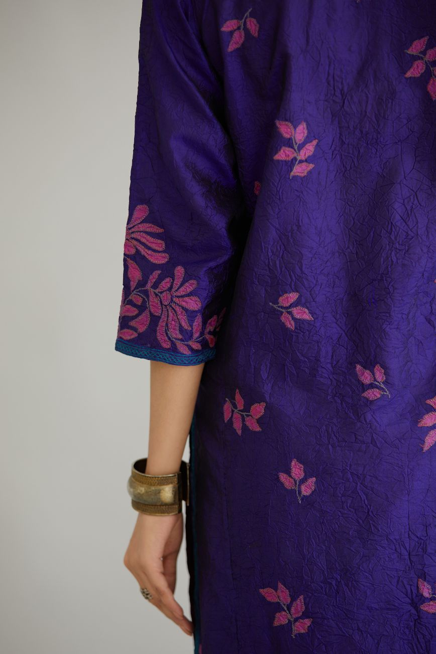 Blue hand crushed silk kurta set with all-over contrast silk fabric applique work and embroidered button placket neckline.
