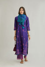 Blue hand crushed silk kurta set with all-over contrast silk fabric applique work and embroidered button placket neckline.
