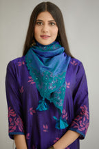 Blue hand crushed silk kurta set with all-over contrast silk fabric applique work and embroidered button placket neckline.