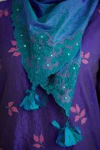 Blue hand crushed silk kurta set with all-over contrast silk fabric applique work and embroidered button placket neckline.