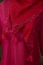Fuchsia hand crushed silk kurta set with contrast silk fabric applique work at hem, side slits and sleeves with an embroidered neckline.