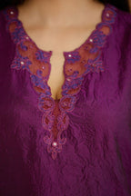 Purple hand crushed silk straight kurta set with silk and organza cutwork embroidery, highlighted with hand attached mirrors.