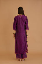 Purple hand crushed silk straight kurta set with silk and organza cutwork embroidery, highlighted with hand attached mirrors.