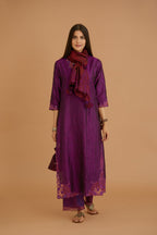 Purple hand crushed silk straight kurta set with silk and organza cutwork embroidery, highlighted with hand attached mirrors.