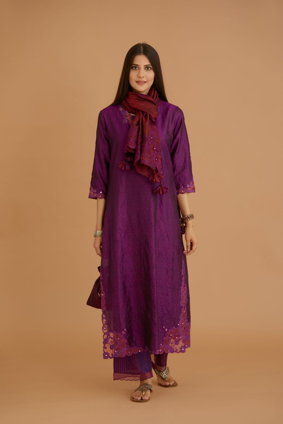 Purple hand crushed silk straight kurta set with silk and organza cutwork embroidery, highlighted with hand attached mirrors.