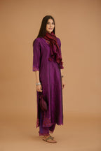 Purple hand crushed silk straight kurta set with silk and organza cutwork embroidery, highlighted with hand attached mirrors.