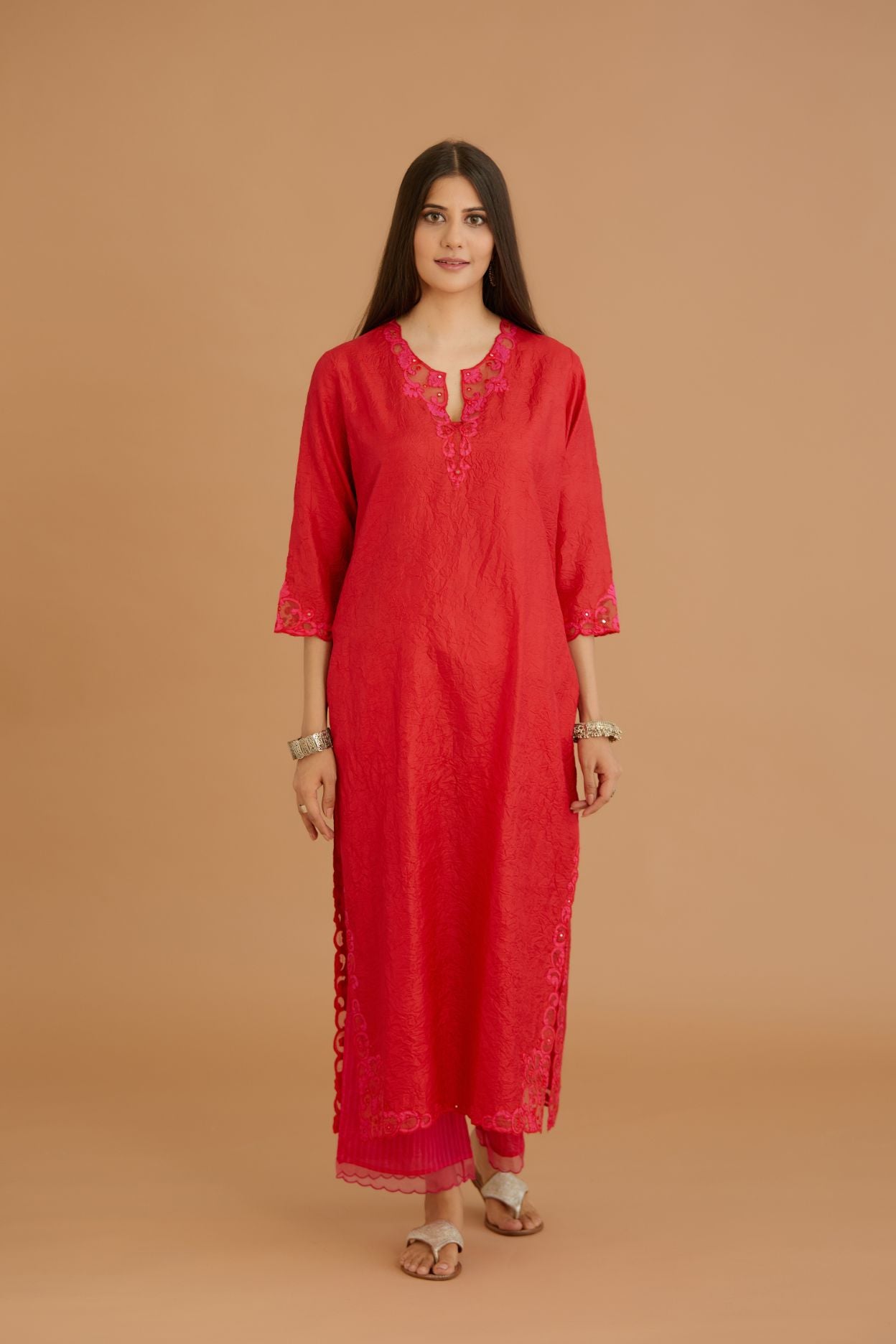 Red hand crushed silk straight kurta set with silk and organza cutwork embroidery, highlighted with hand attached mirrors.