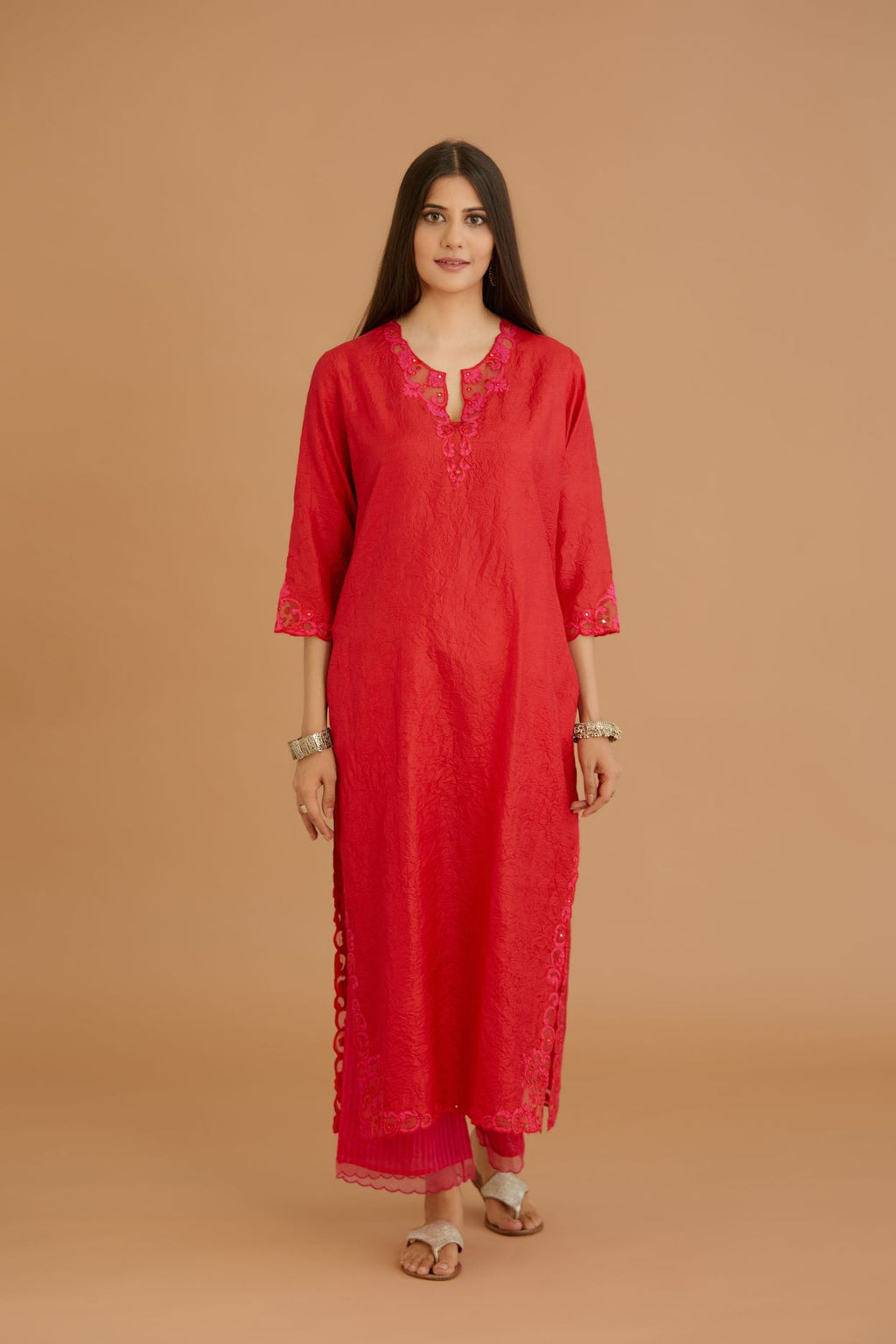 Red hand crushed silk straight kurta set with silk and organza cutwork embroidery, highlighted with hand attached mirrors.