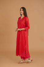 Red hand crushed silk straight kurta set with silk and organza cutwork embroidery, highlighted with hand attached mirrors.