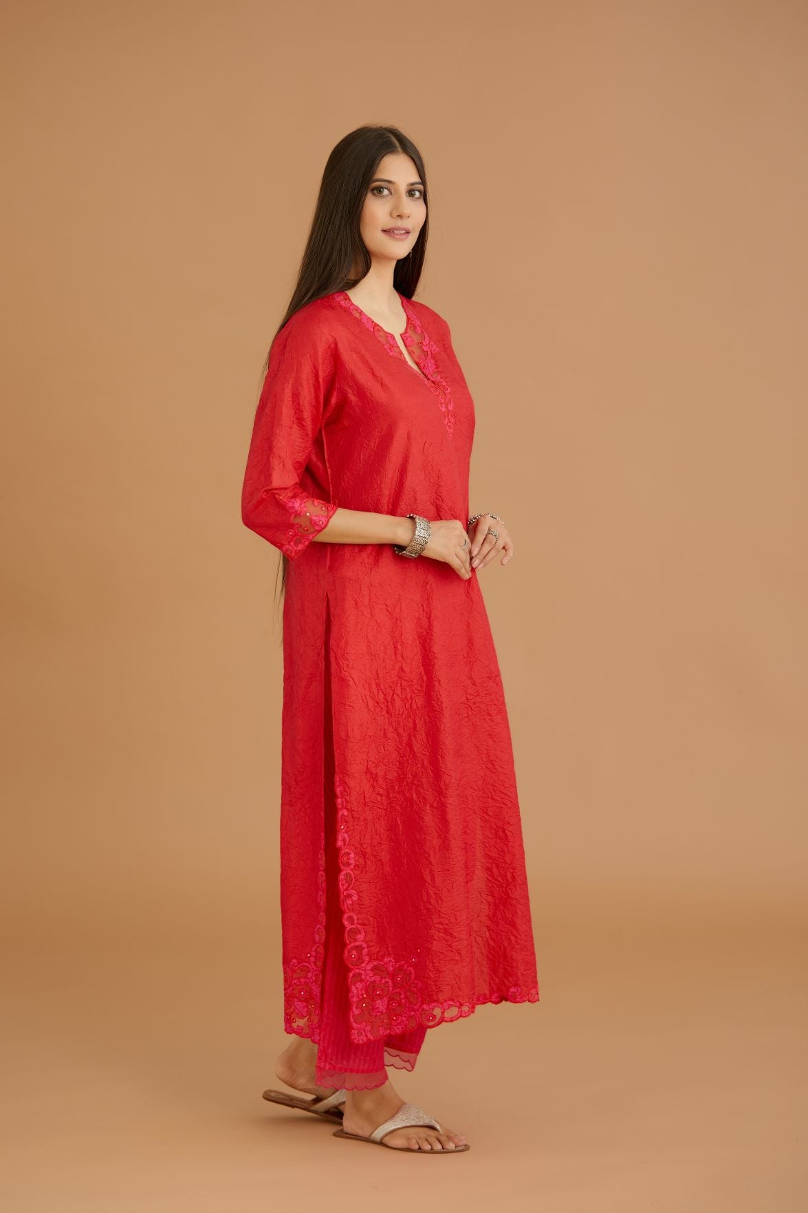 Red hand crushed silk straight kurta set with silk and organza cutwork embroidery, highlighted with hand attached mirrors.