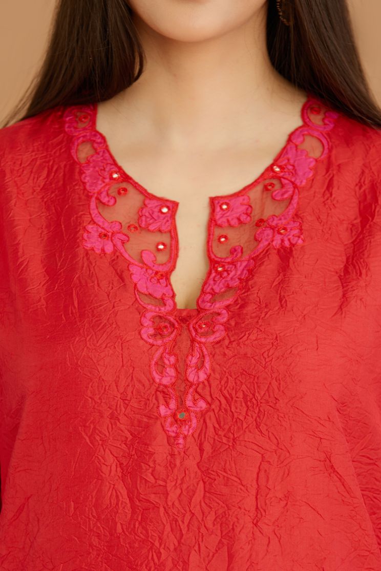 Red hand crushed silk straight kurta set with silk and organza cutwork embroidery, highlighted with hand attached mirrors.