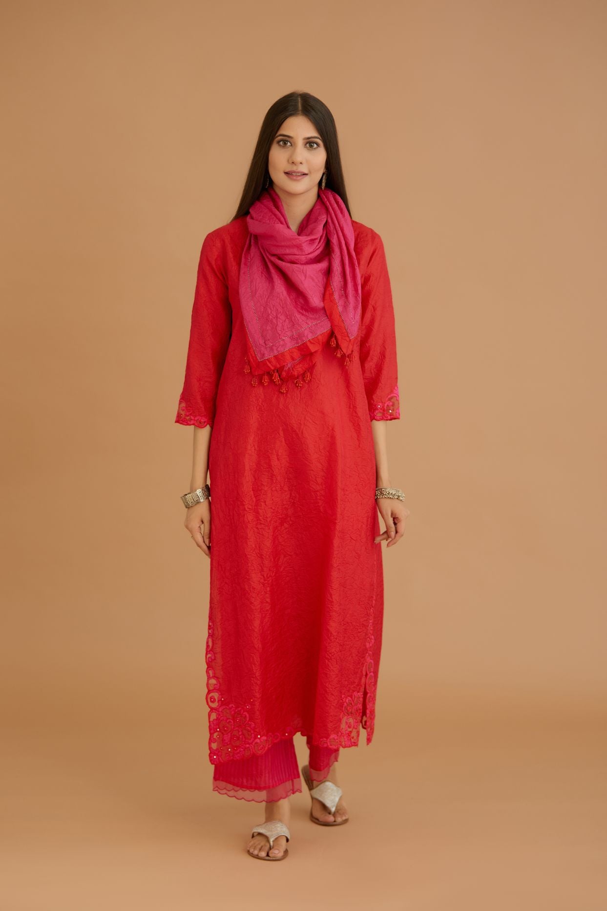 Red hand crushed silk straight kurta set with silk and organza cutwork embroidery, highlighted with hand attached mirrors.