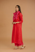 Red hand crushed silk straight kurta set with silk and organza cutwork embroidery, highlighted with hand attached mirrors.