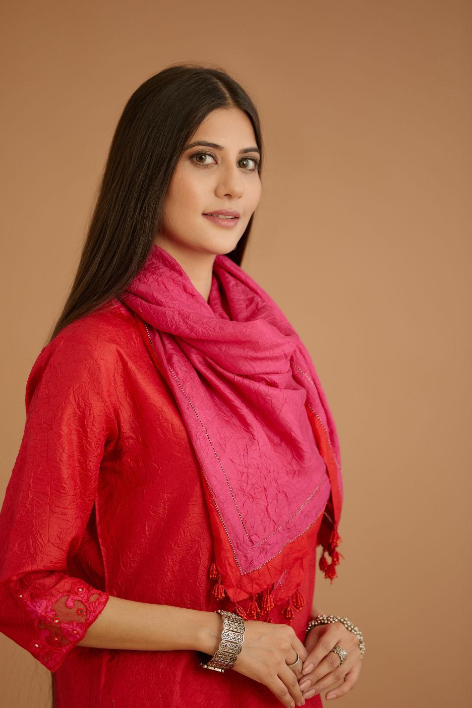 Red hand crushed silk straight kurta set with silk and organza cutwork embroidery, highlighted with hand attached mirrors.