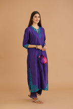 Blue hand crushed silk straight kurta set with silk and organza cutwork embroidery, highlighted with hand attached mirrors.