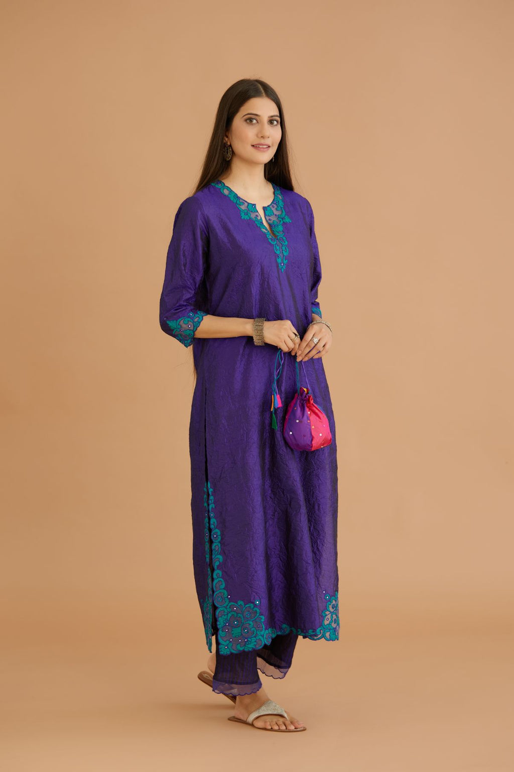 Blue hand crushed silk straight kurta set with silk and organza cutwork embroidery, highlighted with hand attached mirrors.