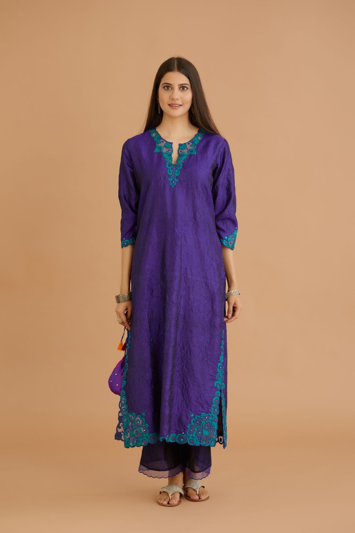 Blue hand crushed silk straight kurta set with silk and organza cutwork embroidery, highlighted with hand attached mirrors.