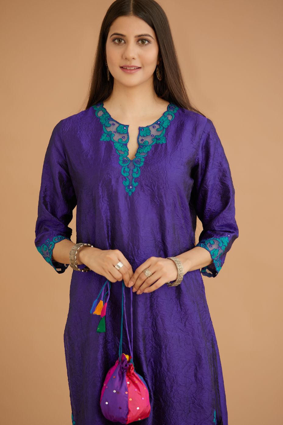 Blue hand crushed silk straight kurta set with silk and organza cutwork embroidery, highlighted with hand attached mirrors.