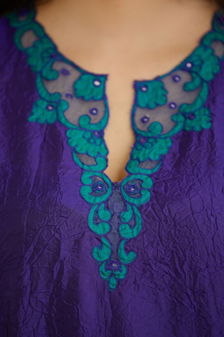 Blue hand crushed silk straight kurta set with silk and organza cutwork embroidery, highlighted with hand attached mirrors.