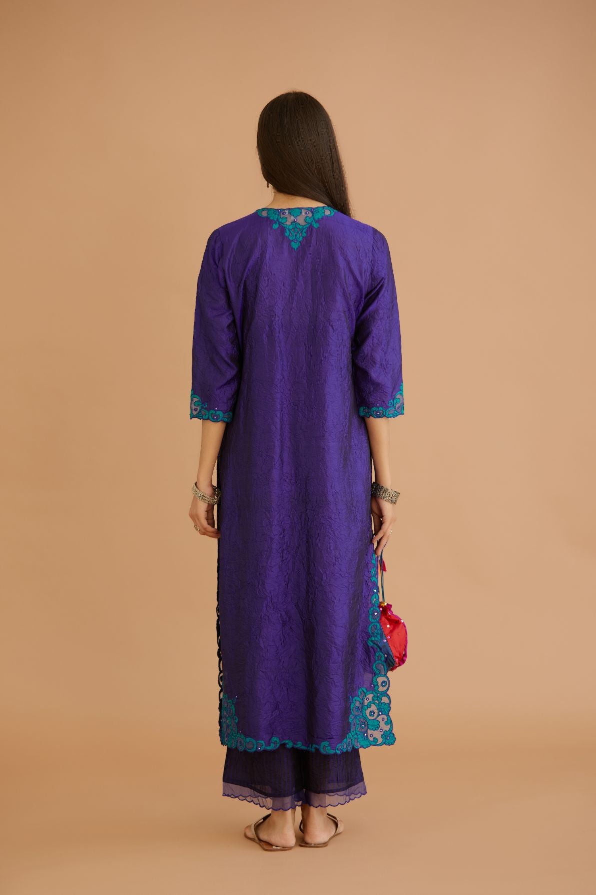 Blue hand crushed silk straight kurta set with silk and organza cutwork embroidery, highlighted with hand attached mirrors.