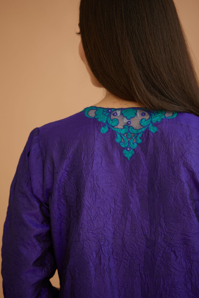 Blue hand crushed silk straight kurta set with silk and organza cutwork embroidery, highlighted with hand attached mirrors.