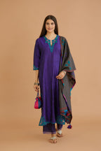Blue hand crushed silk straight kurta set with silk and organza cutwork embroidery, highlighted with hand attached mirrors.