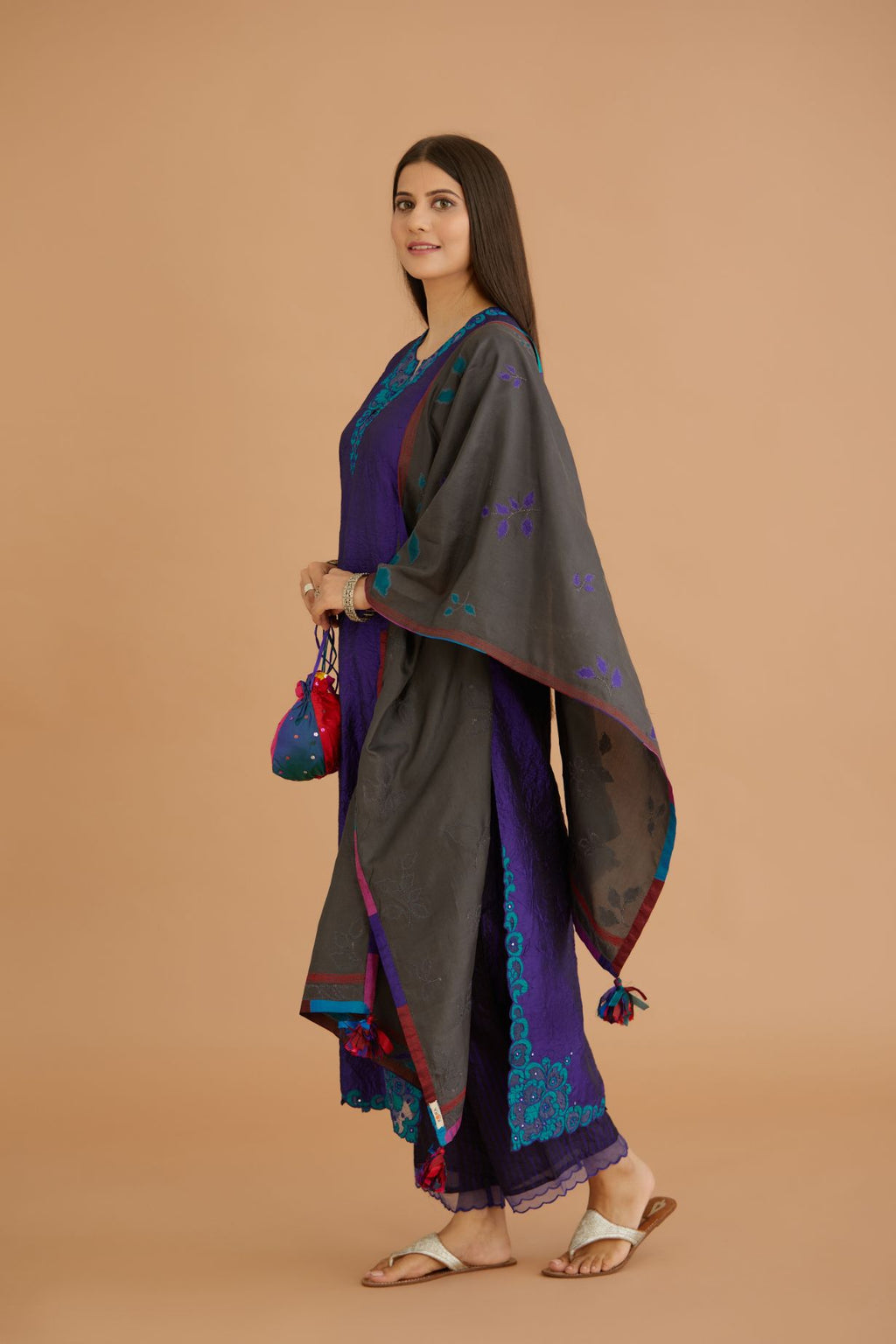 Blue hand crushed silk straight kurta set with silk and organza cutwork embroidery, highlighted with hand attached mirrors.