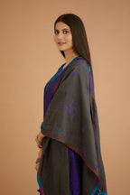 Blue hand crushed silk straight kurta set with silk and organza cutwork embroidery, highlighted with hand attached mirrors.