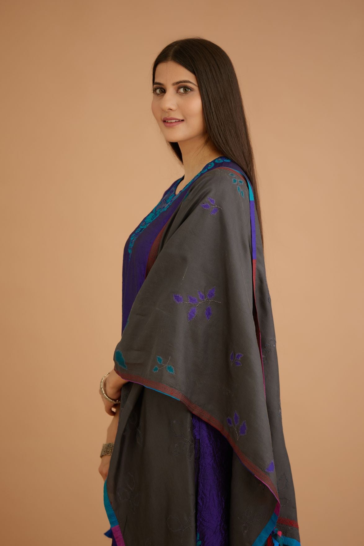 Blue hand crushed silk straight kurta set with silk and organza cutwork embroidery, highlighted with hand attached mirrors.
