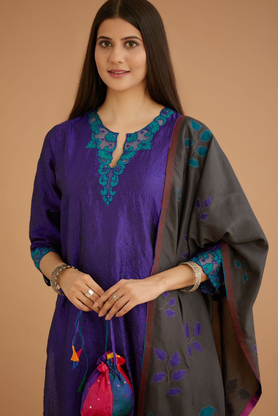 Blue hand crushed silk straight kurta set with silk and organza cutwork embroidery, highlighted with hand attached mirrors.