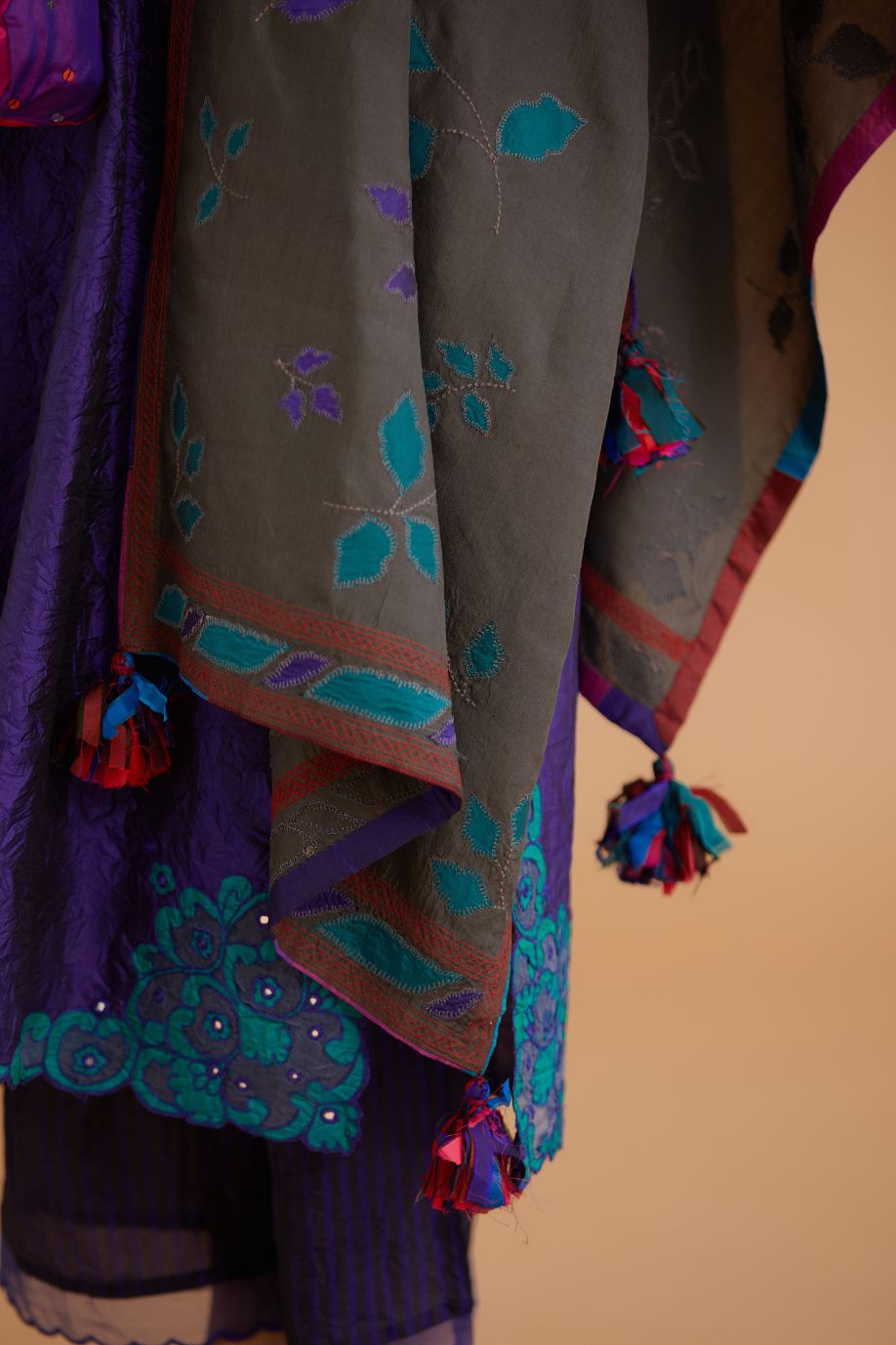 Blue hand crushed silk straight kurta set with silk and organza cutwork embroidery, highlighted with hand attached mirrors.