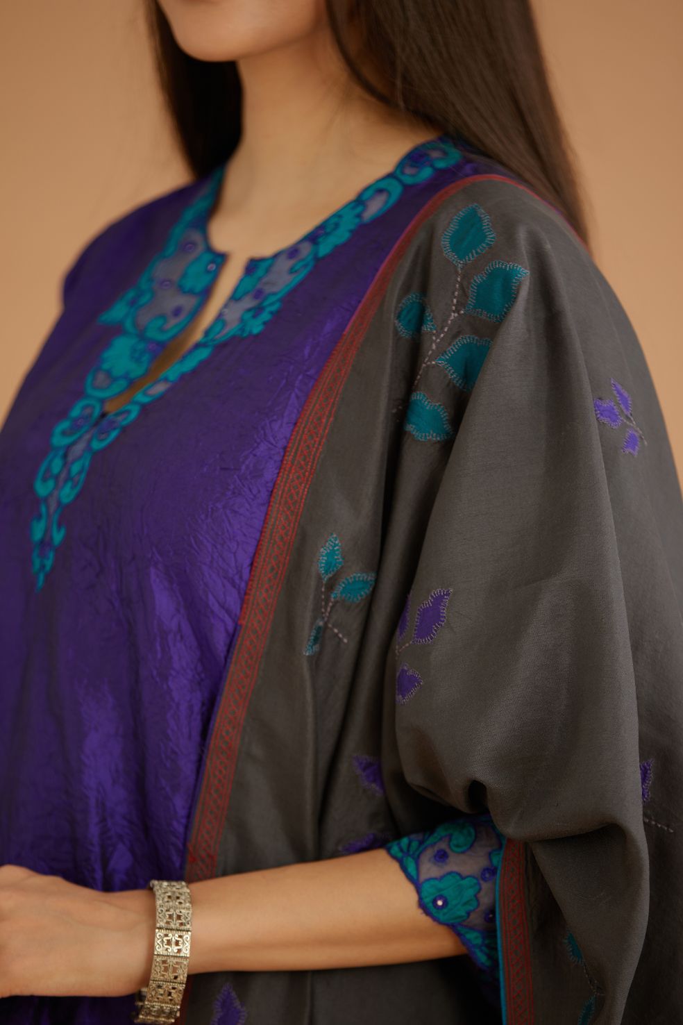 Blue hand crushed silk straight kurta set with silk and organza cutwork embroidery, highlighted with hand attached mirrors.