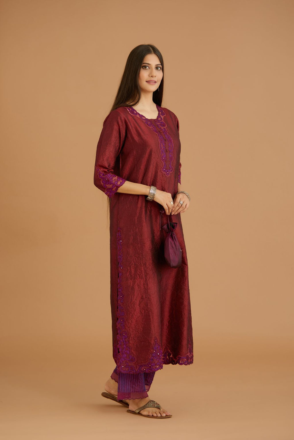 Maroon hand crushed silk straight kurta set with silk and organza cutwork embroidery, highlighted with hand attached mirrors.