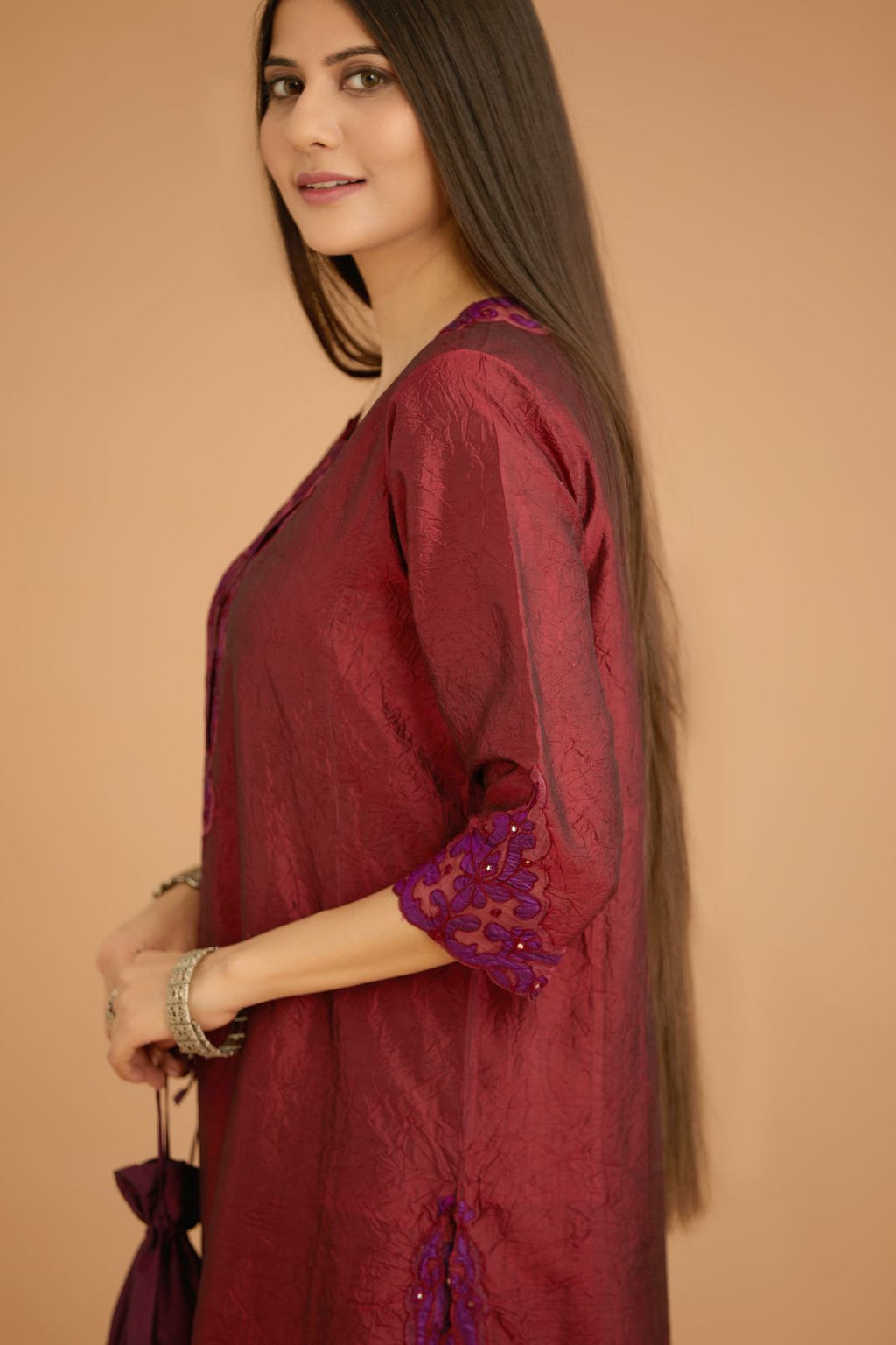 Maroon hand crushed silk straight kurta set with silk and organza cutwork embroidery, highlighted with hand attached mirrors.