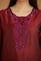 Maroon hand crushed silk straight kurta set with silk and organza cutwork embroidery, highlighted with hand attached mirrors.