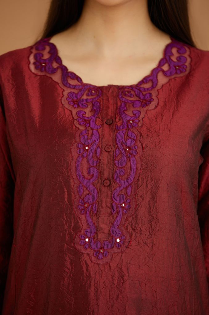 Maroon hand crushed silk straight kurta set with silk and organza cutwork embroidery, highlighted with hand attached mirrors.