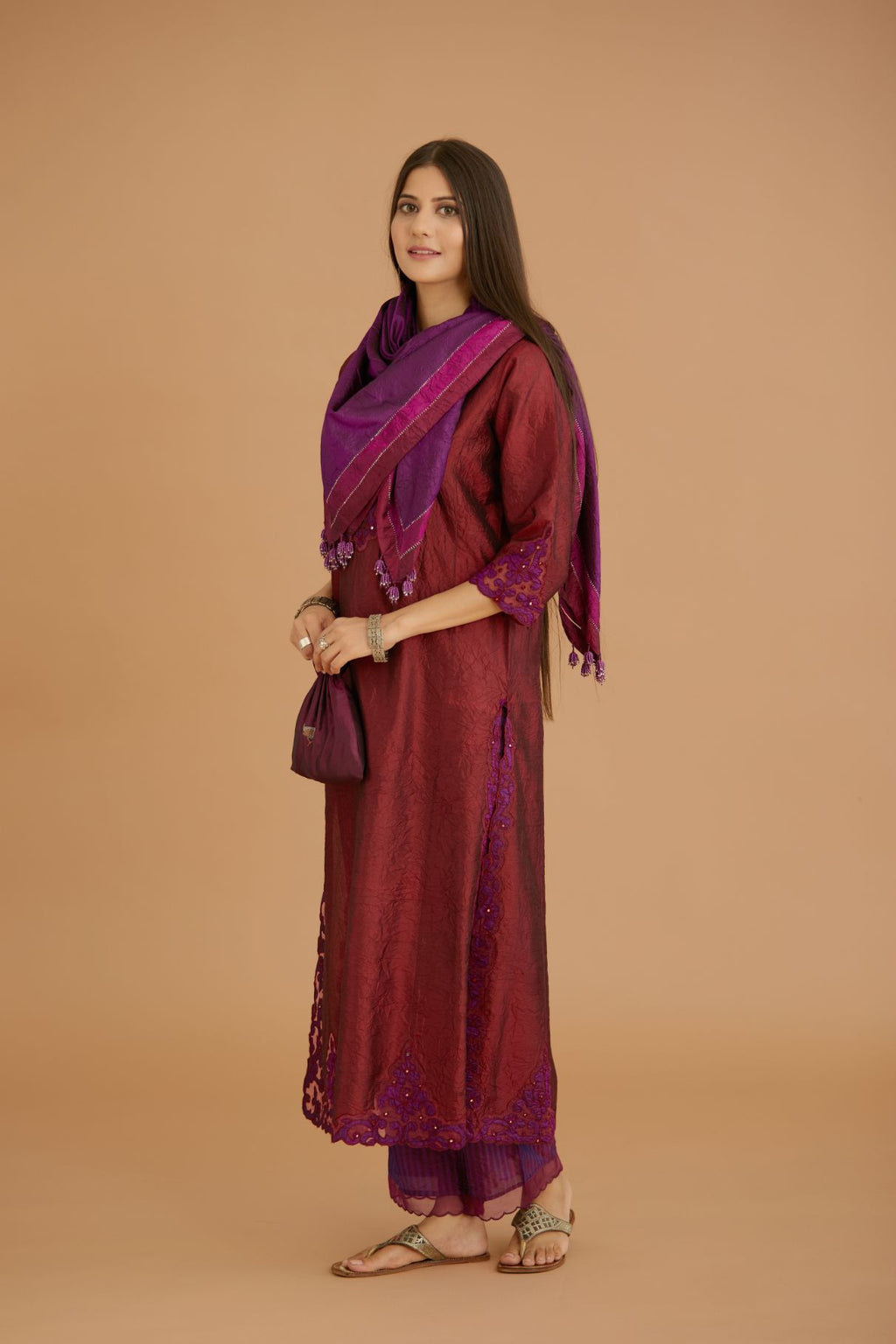 Maroon hand crushed silk straight kurta set with silk and organza cutwork embroidery, highlighted with hand attached mirrors.