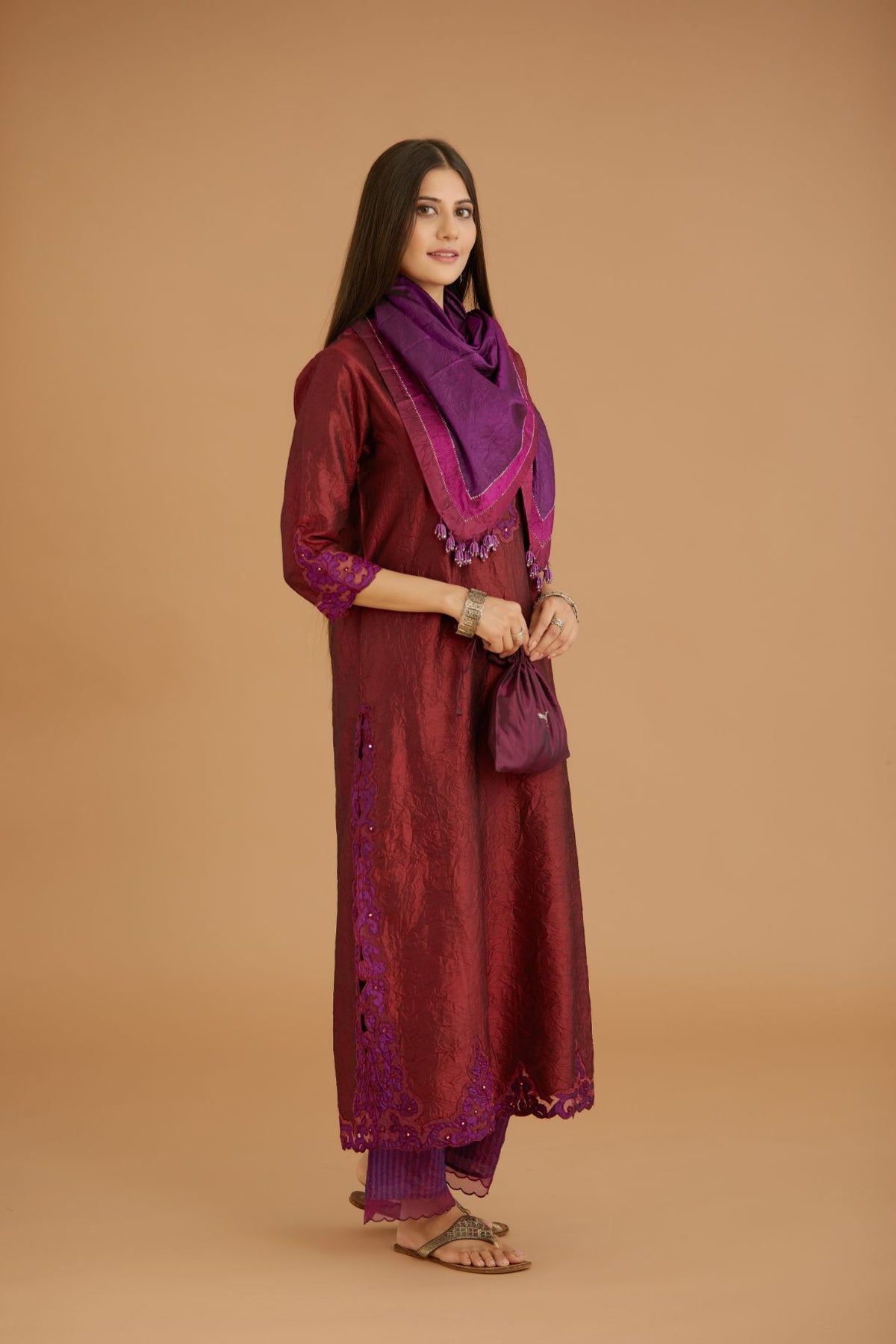 Maroon hand crushed silk straight kurta set with silk and organza cutwork embroidery, highlighted with hand attached mirrors.