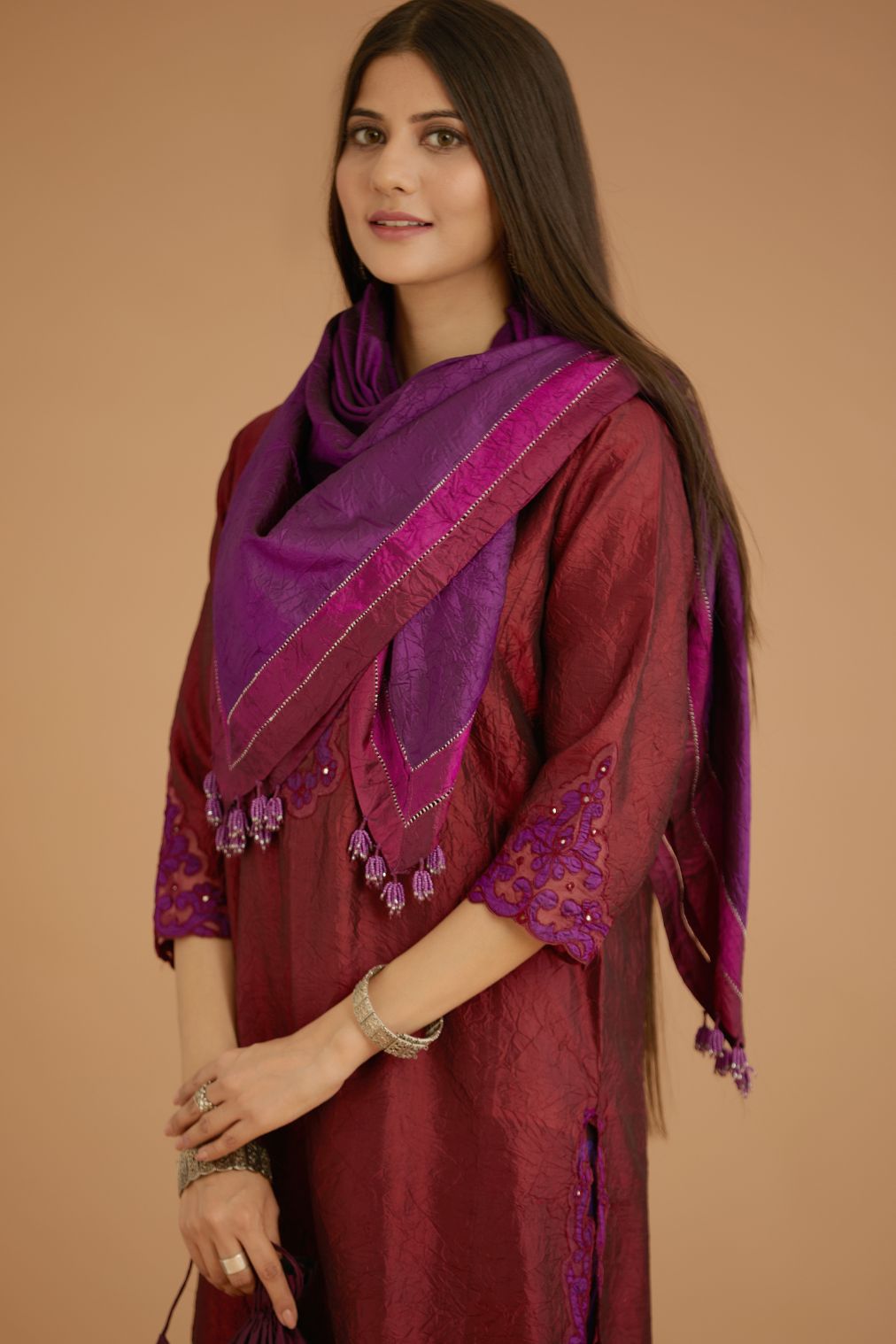 Maroon hand crushed silk straight kurta set with silk and organza cutwork embroidery, highlighted with hand attached mirrors.