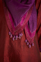Maroon hand crushed silk straight kurta set with silk and organza cutwork embroidery, highlighted with hand attached mirrors.