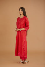 Red hand crushed silk straight kurta set with silk and organza cutwork embroidery, highlighted with hand attached mirrors.