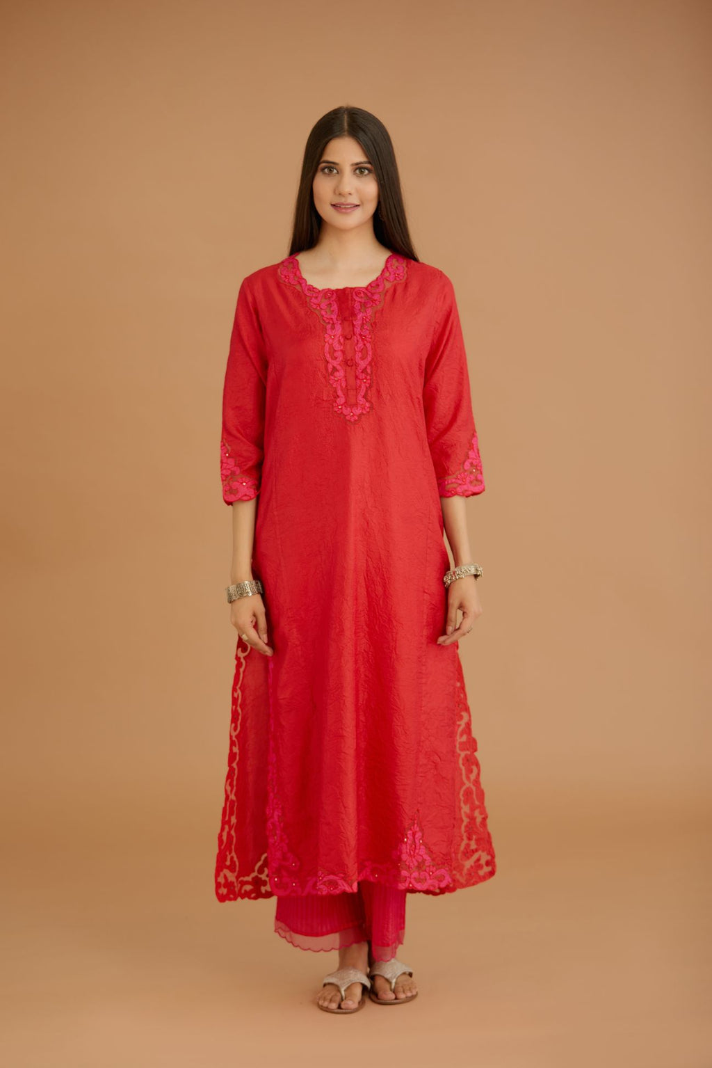 Red hand crushed silk straight kurta set with silk and organza cutwork embroidery, highlighted with hand attached mirrors.
