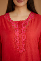 Red hand crushed silk straight kurta set with silk and organza cutwork embroidery, highlighted with hand attached mirrors.