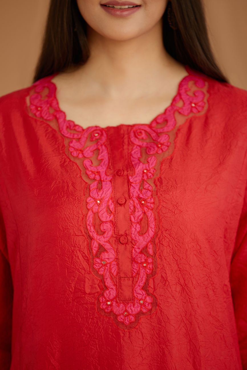 Red hand crushed silk straight kurta set with silk and organza cutwork embroidery, highlighted with hand attached mirrors.