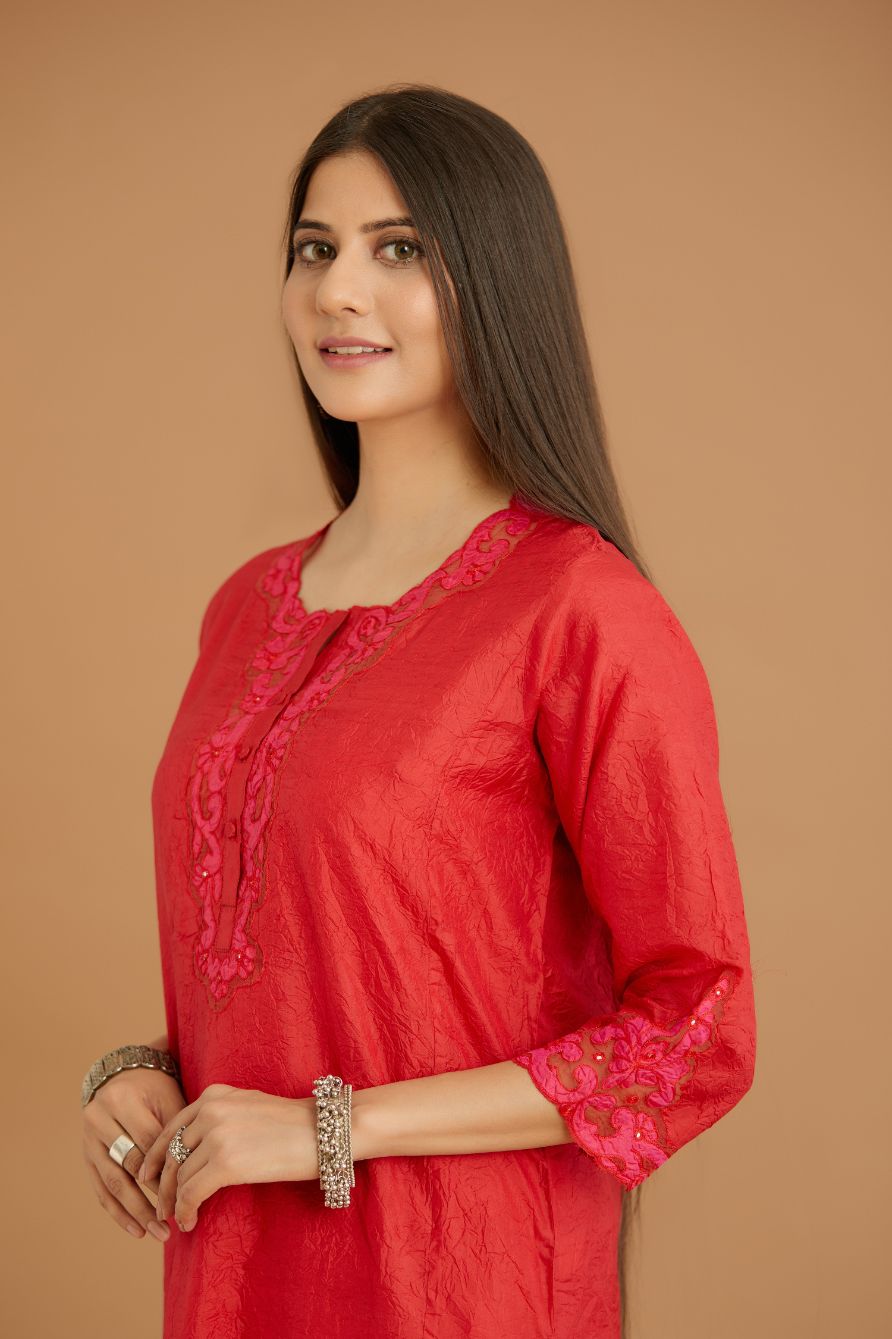 Red hand crushed silk straight kurta set with silk and organza cutwork embroidery, highlighted with hand attached mirrors.