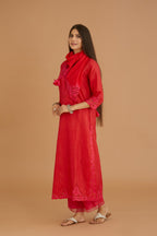 Red hand crushed silk straight kurta set with silk and organza cutwork embroidery, highlighted with hand attached mirrors.